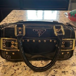Prada black leather small purse.